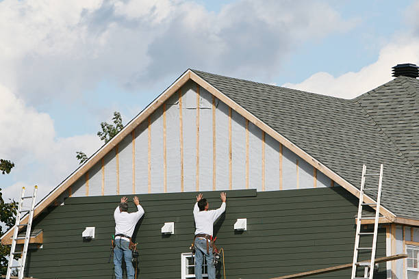 Professional Siding technician working in Brielle, NJ